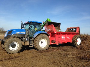 Merlo loading muckspreader with FYM